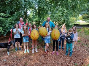 Children aged 7-14 gather at Ness Islands, Inverness, to showcase their findings for the High Life Highland 'Myths & Monsters' event